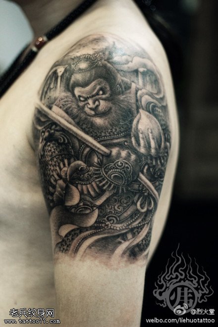 手臂猴子纹身图案由武汉纹身店提供_武汉纹身
