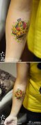 女生手臂超酷漂亮的彩色皇冠纹身图案