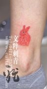 腿部可爱的指纹小兔子纹身图案