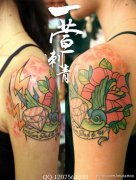 女生手臂漂亮潮流的燕子钻石玫瑰花纹身图案