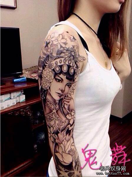 一款女性手臂花旦纹身图案由武汉纹身店推荐