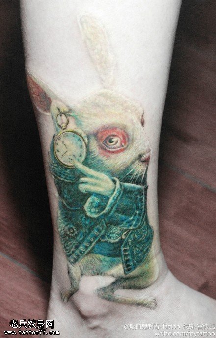 可爱漂亮老鼠钟表纹身图案