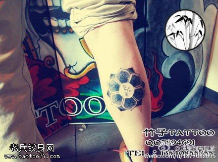 胳膊点刺佛前莲花纹身图案