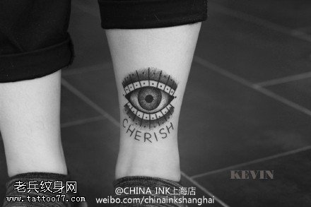 腿部点刺虔诚全知之眼纹身图案
