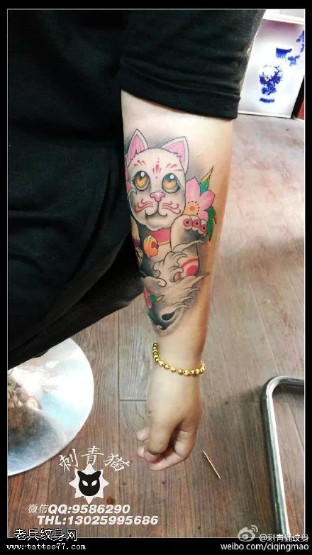 漂亮的卡通猫咪纹身图案