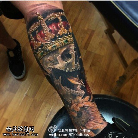 小腿骷髅皇冠太阳花纹身图案