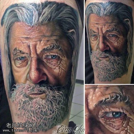 手臂逼真写实的肖像纹身图案