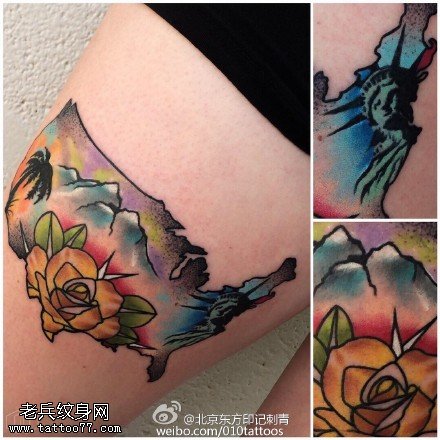 大腿上的风景花卉纹身图案