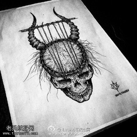手稿吊起来的骷髅纹身图案