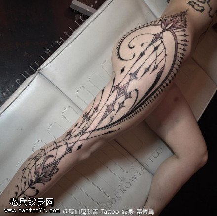 腿部点刺的图腾纹身图案
