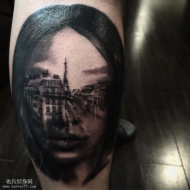小腿面部的城市纹身图案