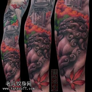 手臂的石狮子纹身图案