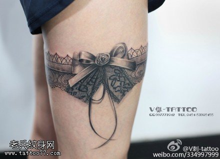 大腿蕾丝的蝴蝶结纹身图案