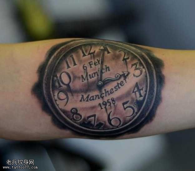 手臂闹钟纹身图案