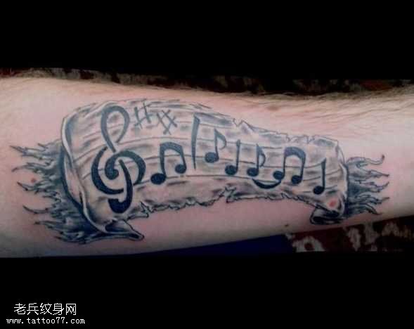 手臂音符纹身图案