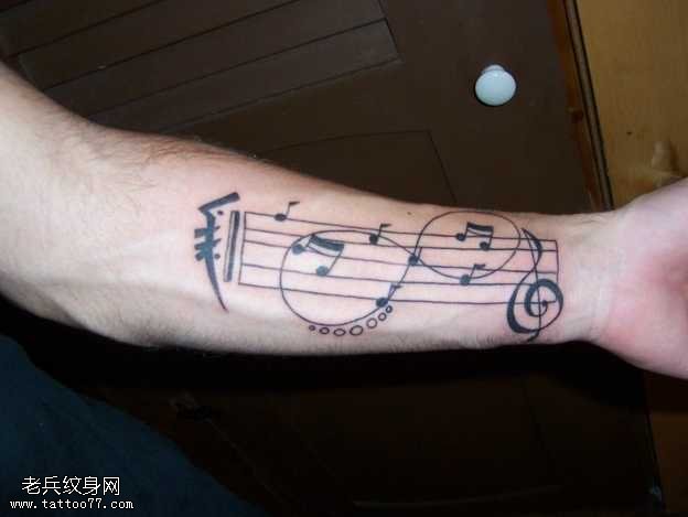 手臂音乐纹身图案