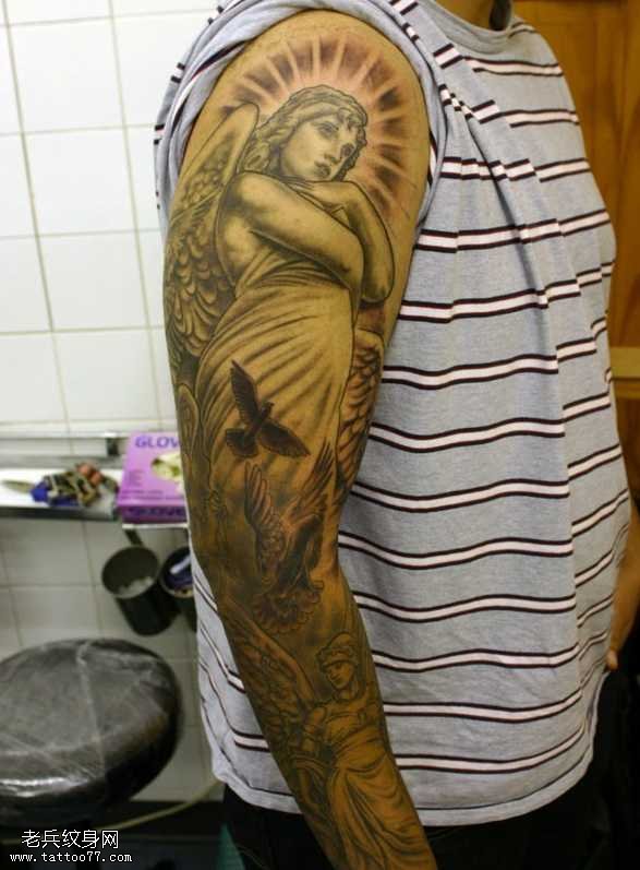 胳膊个性圣女纹身图案