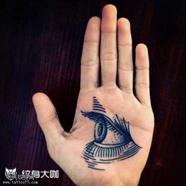 手部眼睛纹身图案