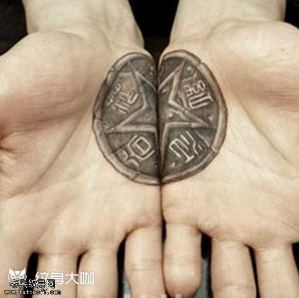 手部五芒星金钱纹身图案