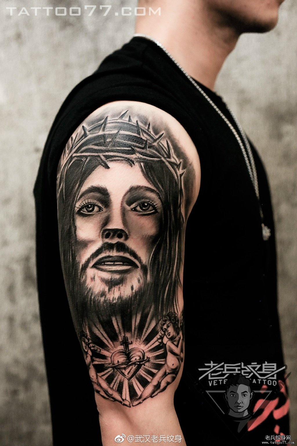 手臂耶稣纹身图案作品