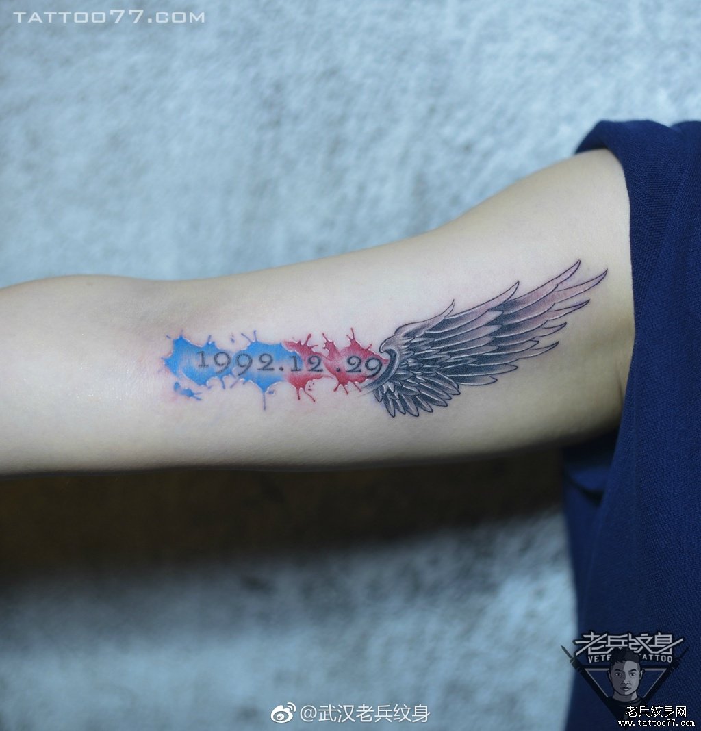 大臂内侧水彩数字翅膀纹身图案作品