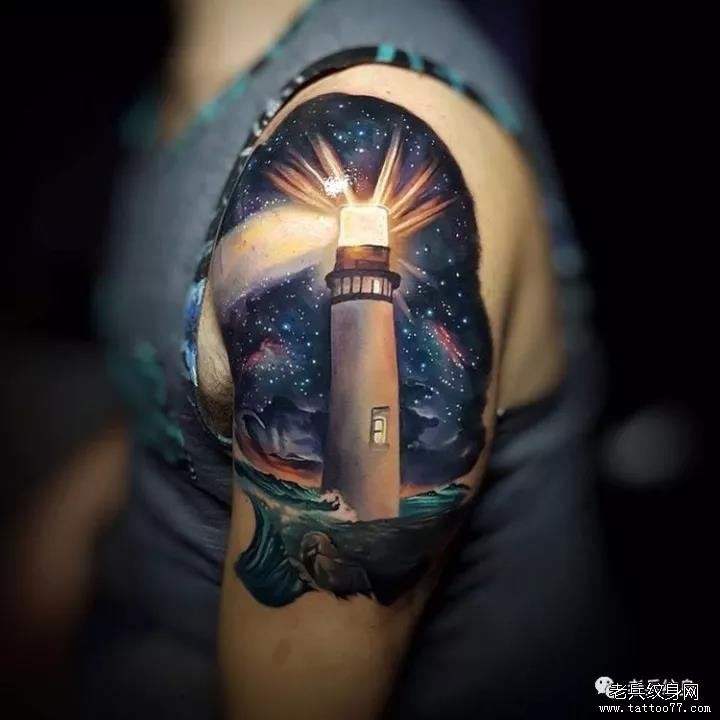 手臂重彩色灯塔星空纹身图案
