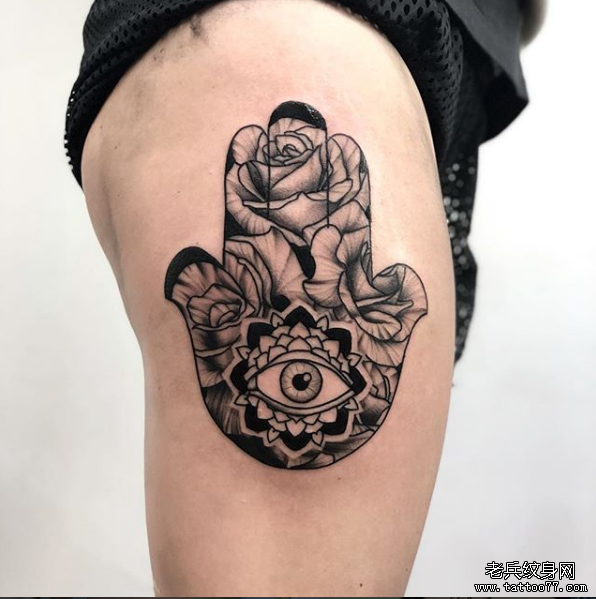 大腿手眼睛花朵纹身图案