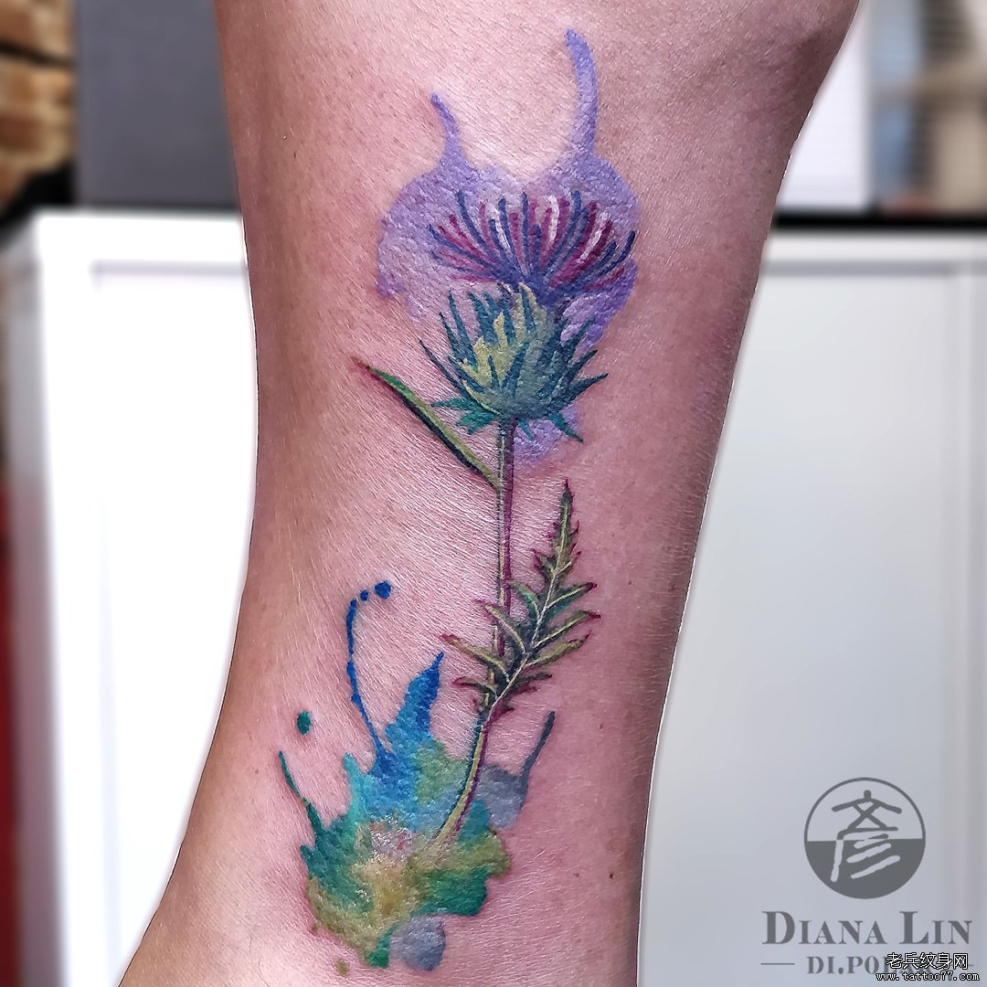 小腿彩色花卉纹身图案