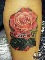 腿部彩色玫瑰花纹身图案